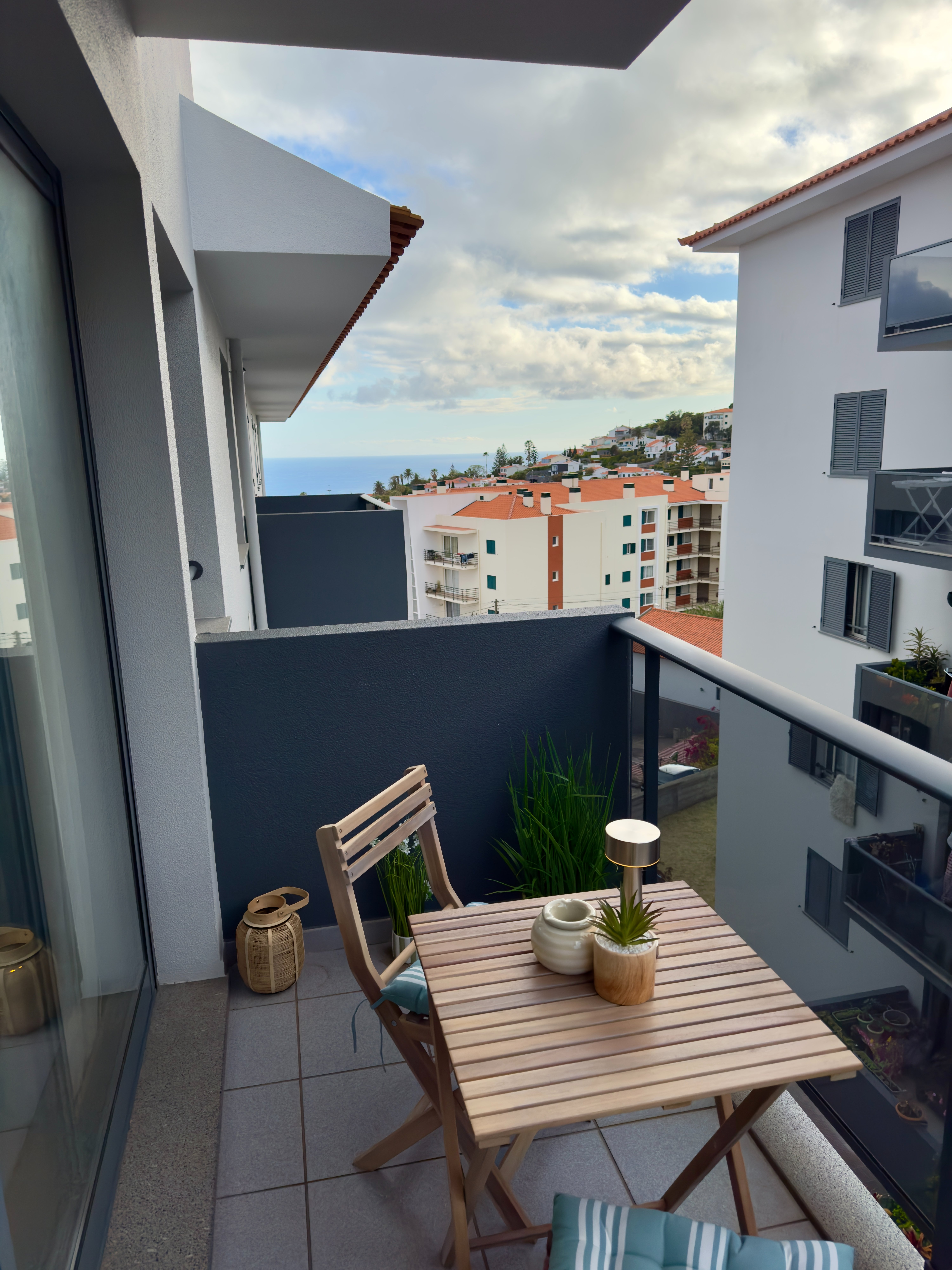 Ocean view balcony at Coastal Garden apartment in Madeira on a mild winter day