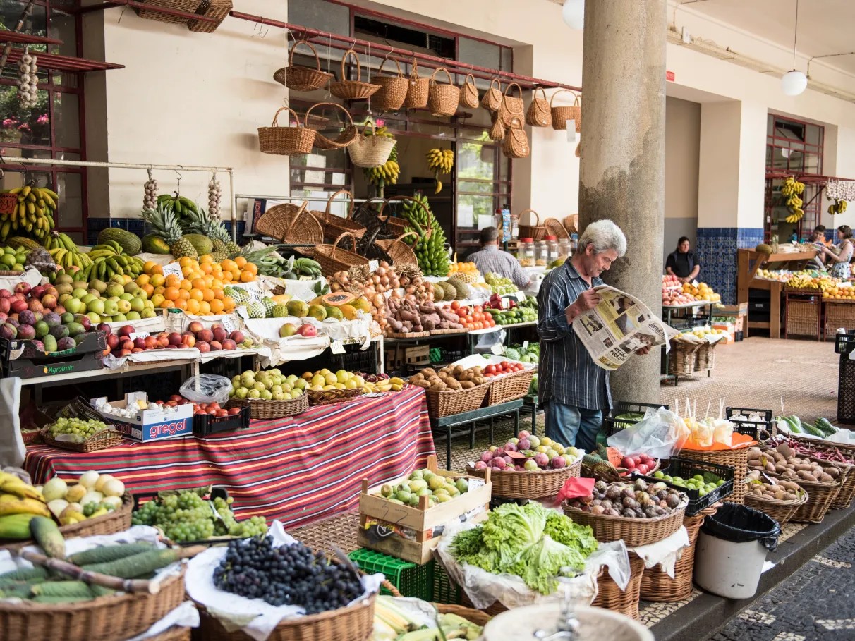 Fresh fruit and vegetable stalls at Mercado dos Lavradores in Funchal Madeira